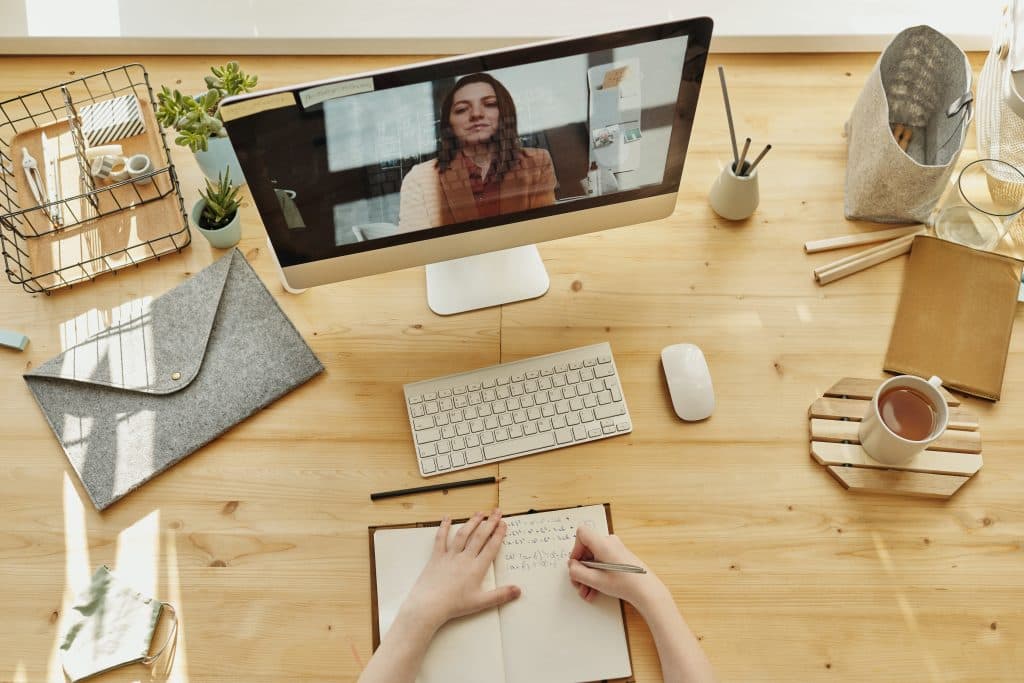 A video call taking place at someone's work desk