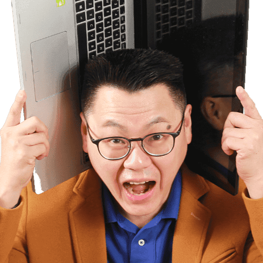 Thong Chi Wah, founder of WebKungfu, holding two laptops